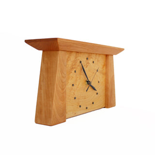 Side view: Tapered rectangular cherry wood framed maple wood clock.