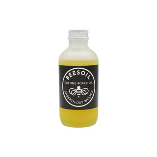 Frosted glass bottle of all natural Beesoil Cutting Board Oil made in small batches by Sabbath-Day Woods.