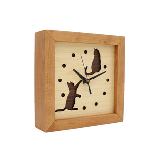 Cats at Play, handcrafted cherry wooden Box Clock with cat design in maple over a walnut background. Angle view