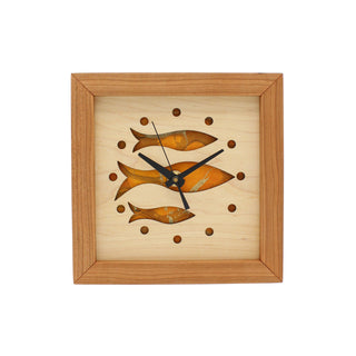 Fish at School, handcrafted cherry wooden Box Clock with fish design in maple over a orange background.